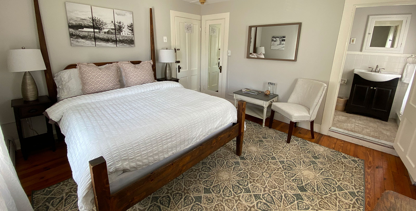 a bedroom with a bed and a chair