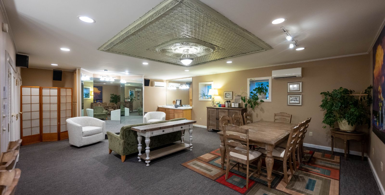 a room with a table and chairs