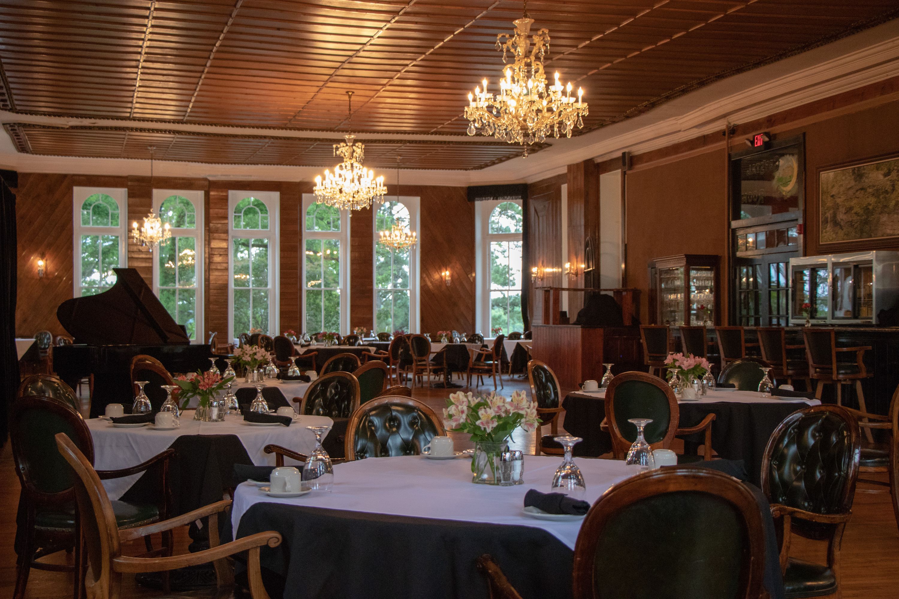 a room with tables and chairs