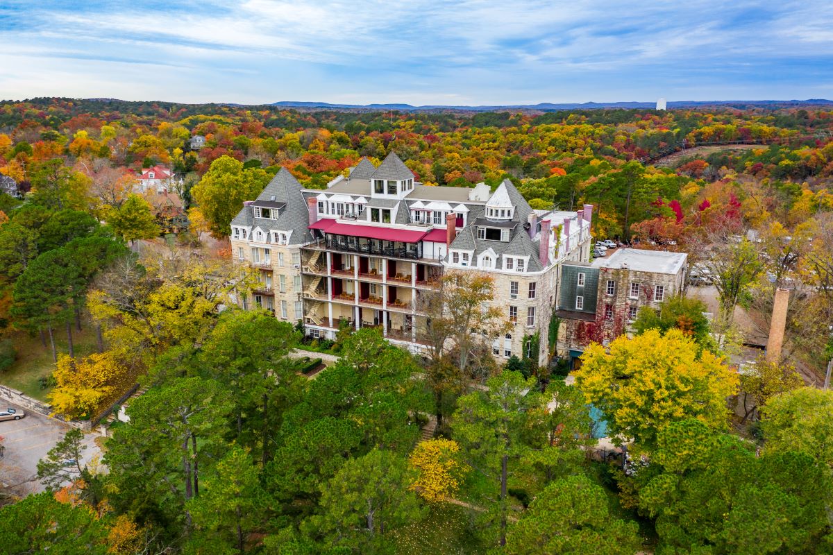 a large building surrounded by trees