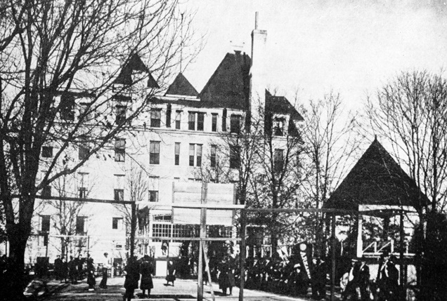 a group of people outside a building
