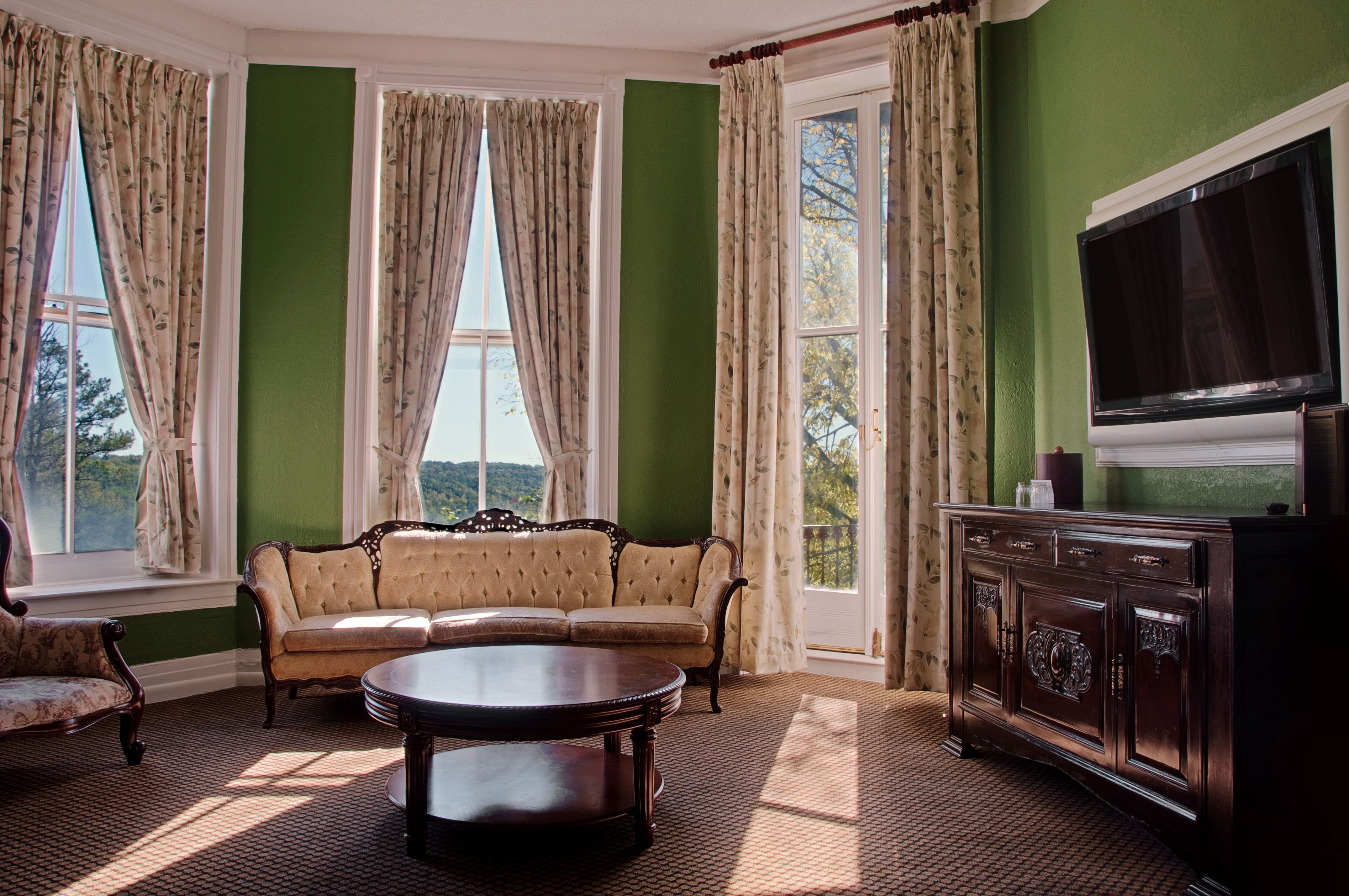 a room with a television and a couch