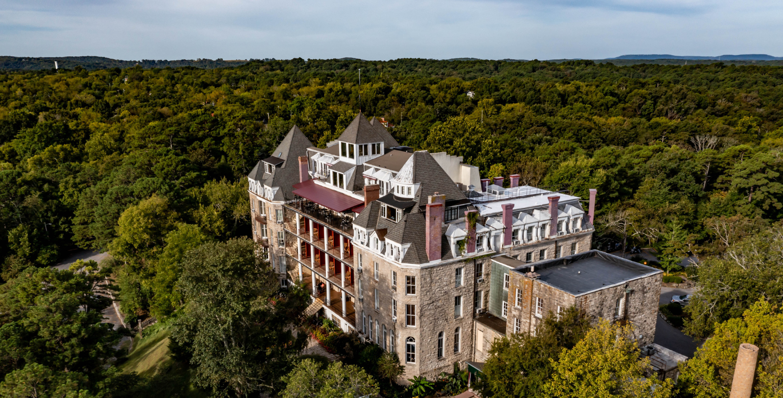 a large building surrounded by trees