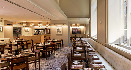 a restaurant with tables and chairs