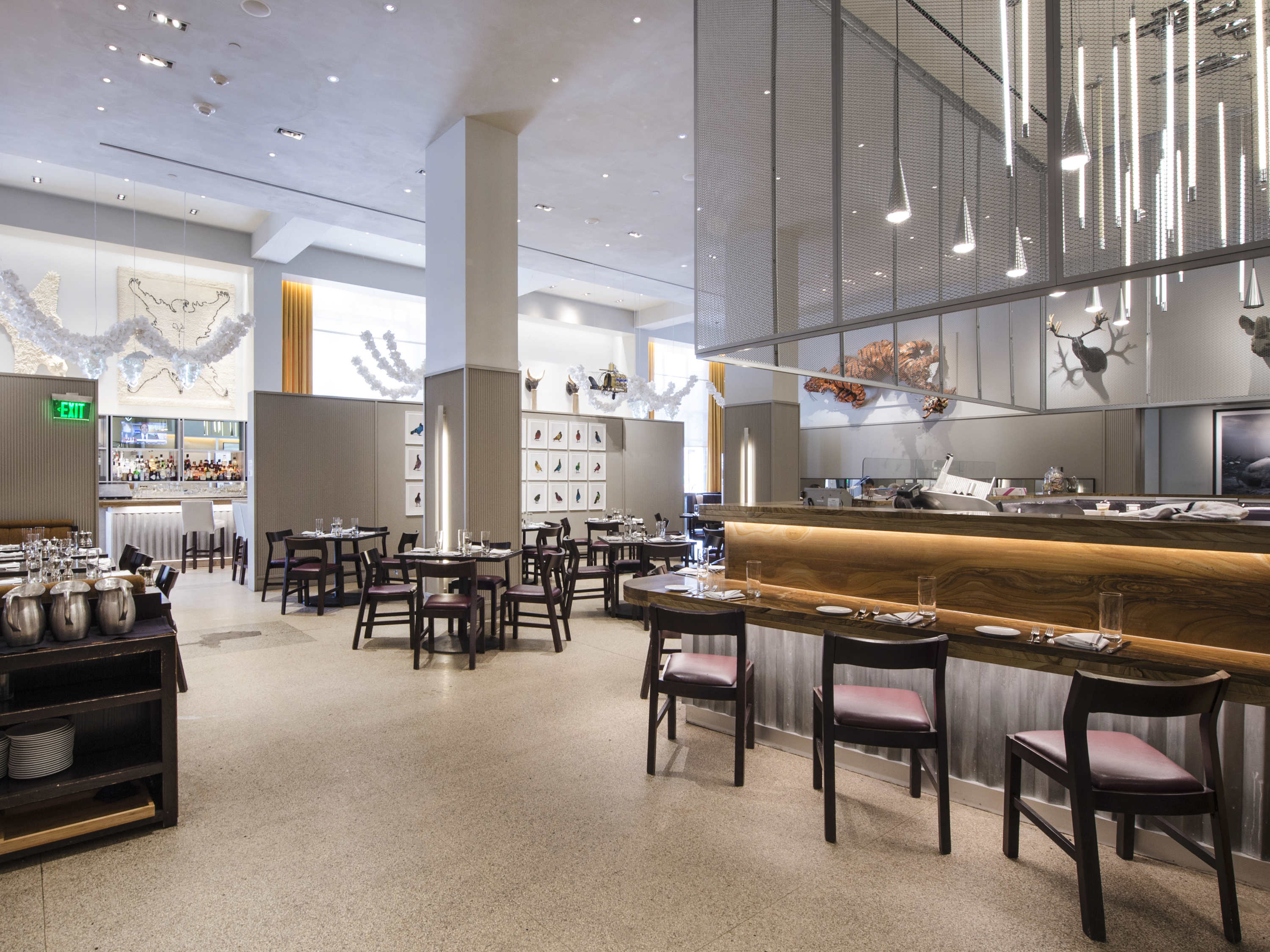 a restaurant with tables and chairs