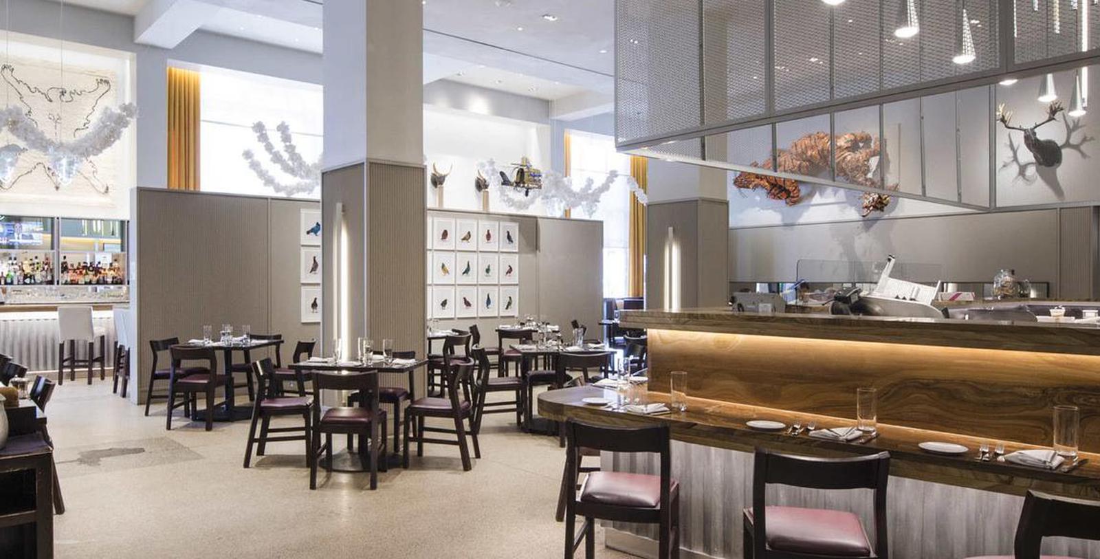 a restaurant with tables and chairs