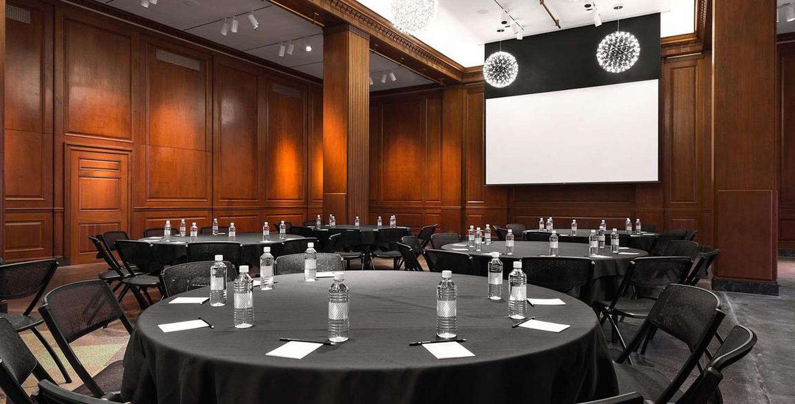 a room with tables and chairs