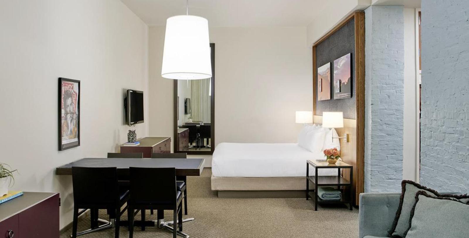 a room with a bed and a table