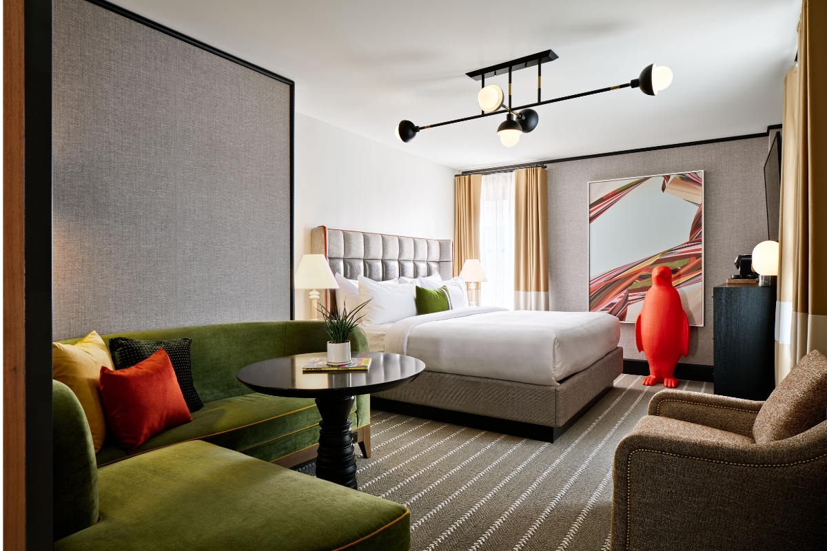 a room with a bed and sofa
