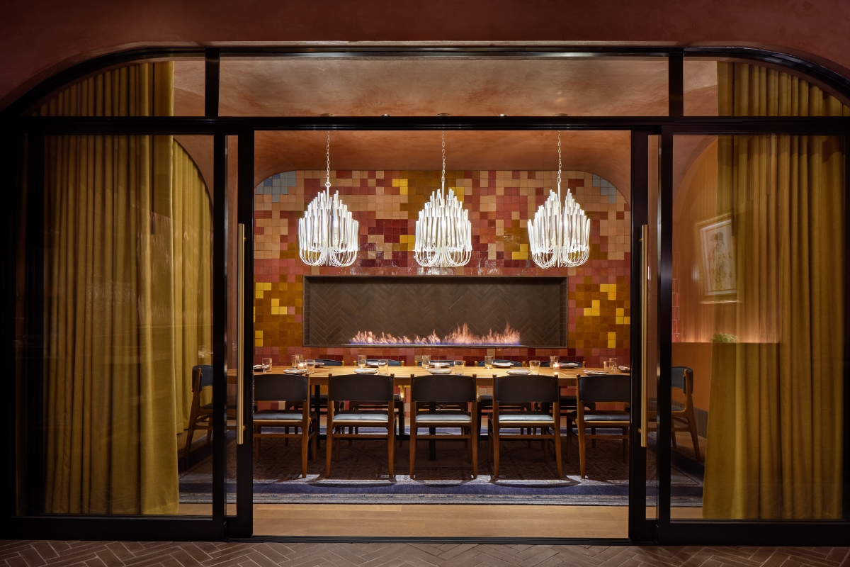 a dining room with a table and chairs