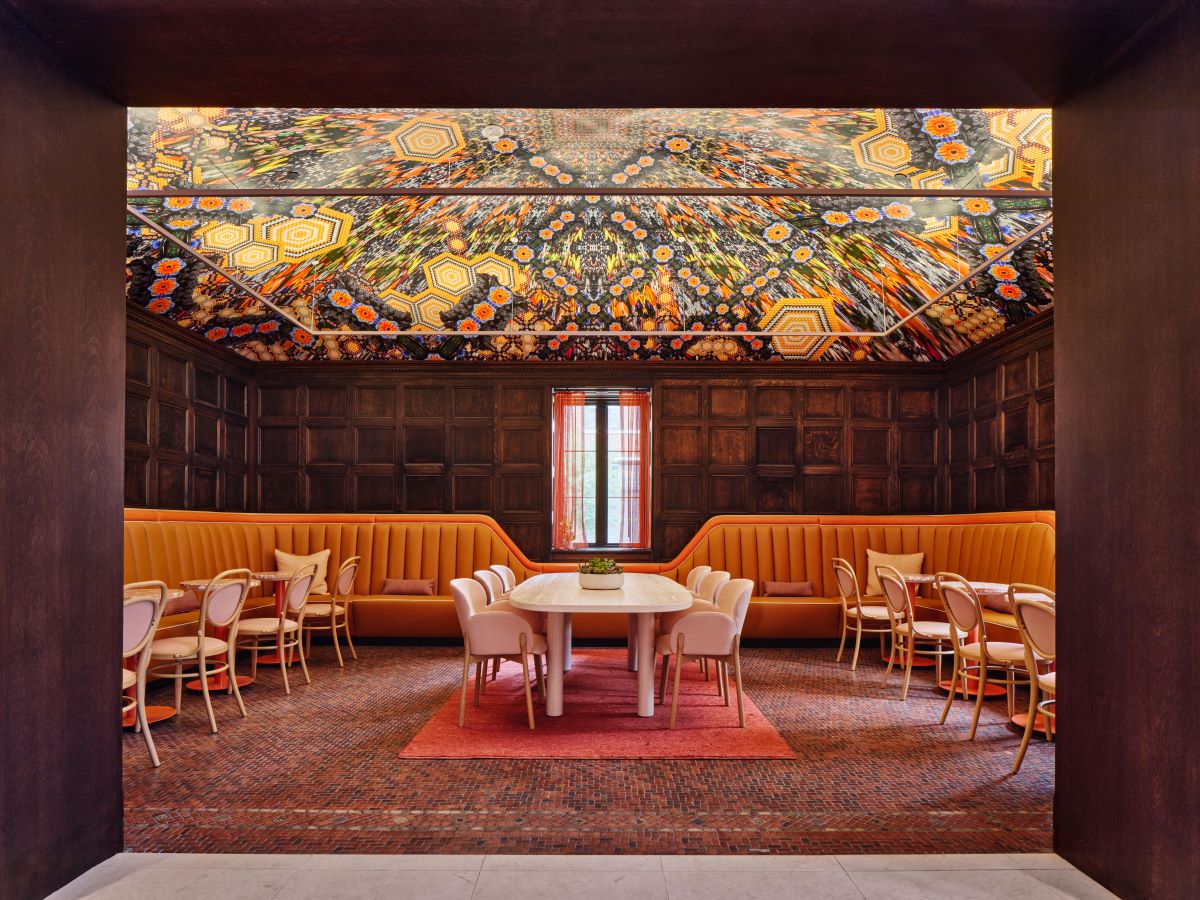 a room with a table and chairs