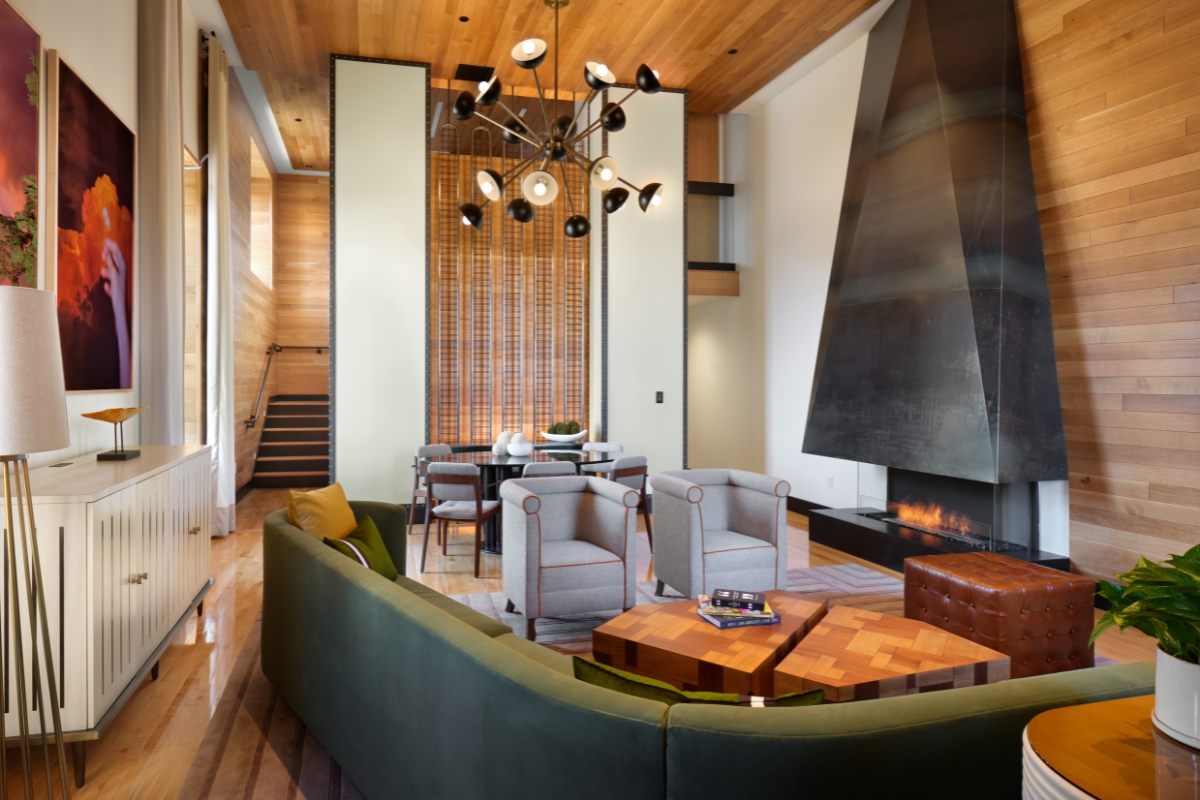 a living room with a fireplace and couches