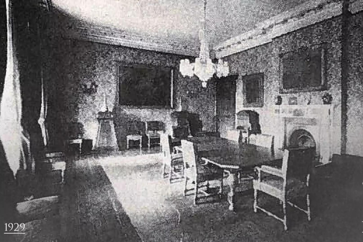 a room with a table and chairs
