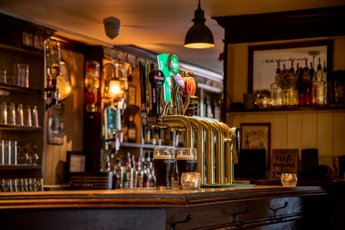 a bar with a few beer taps