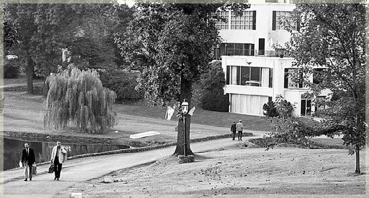 a couple of people walking on a path