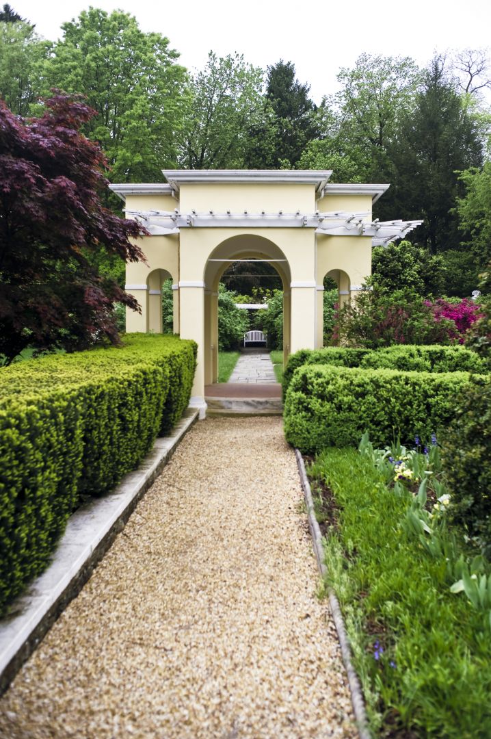 a path leading to a garden