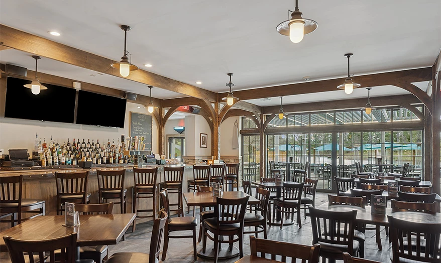 a room with tables and chairs