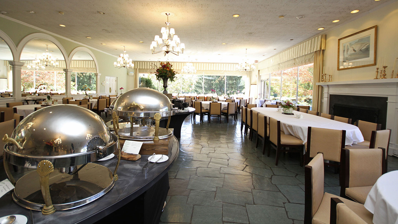 a restaurant with tables and chairs