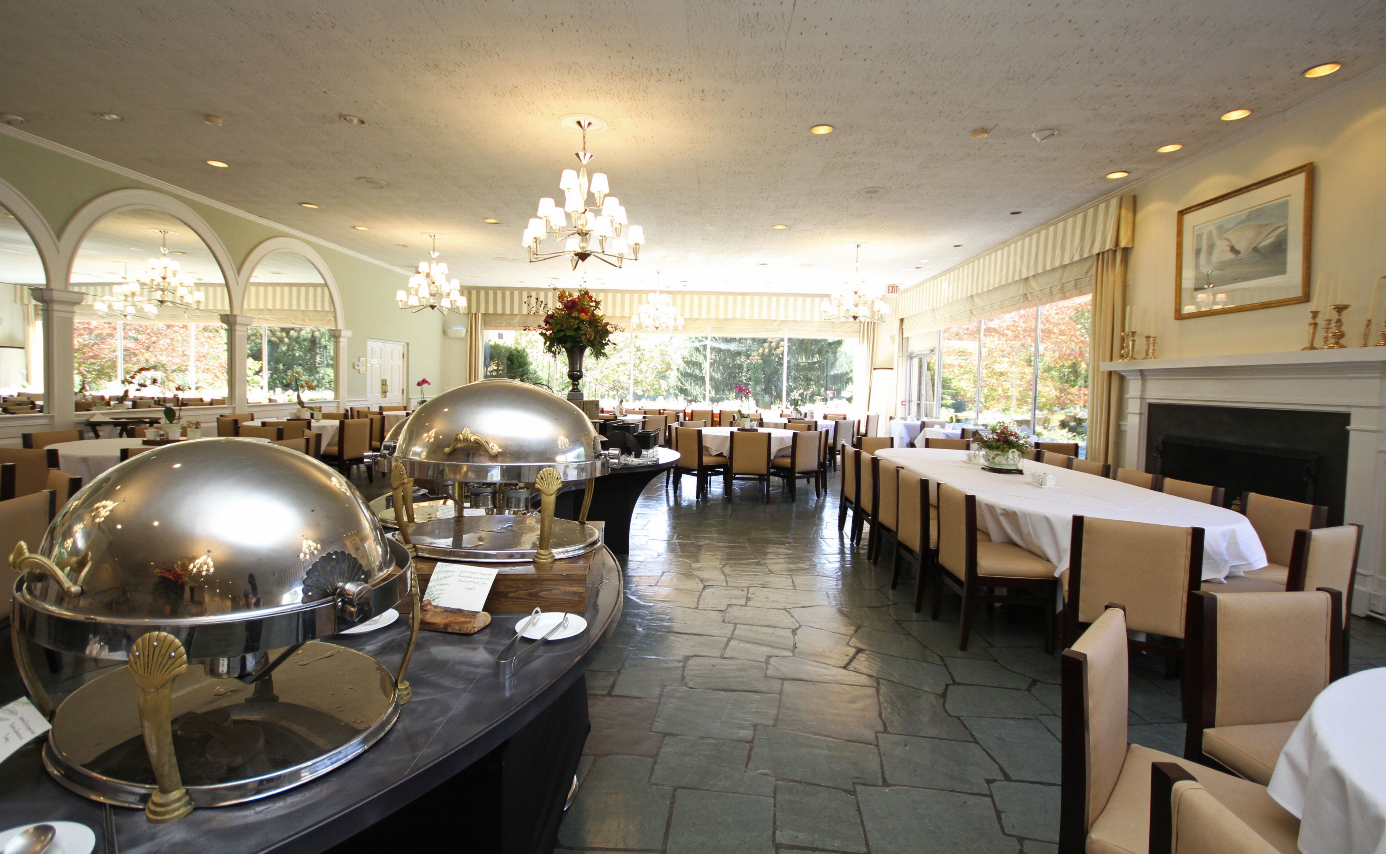 a restaurant with tables and chairs