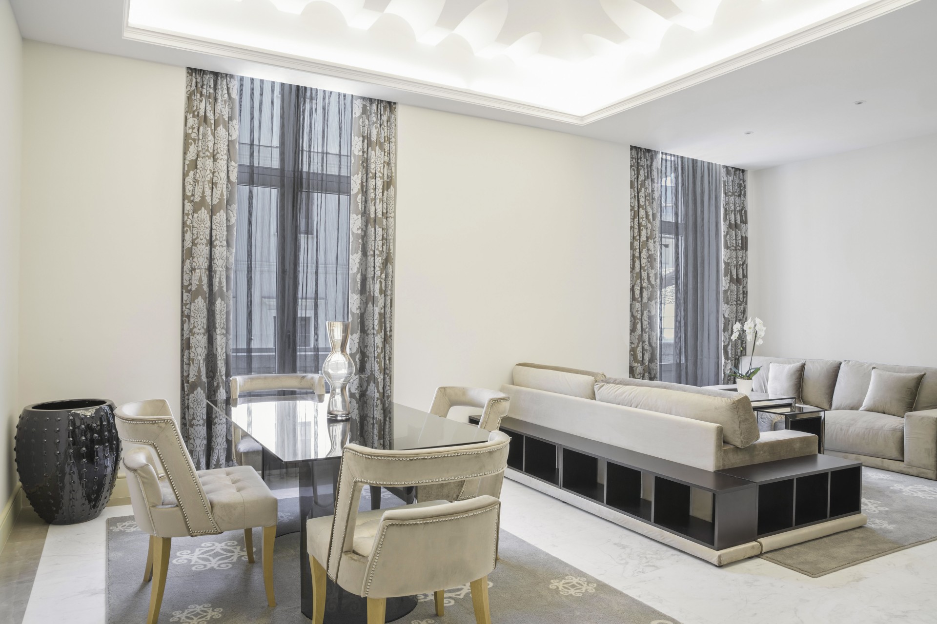 a room with a table and chairs