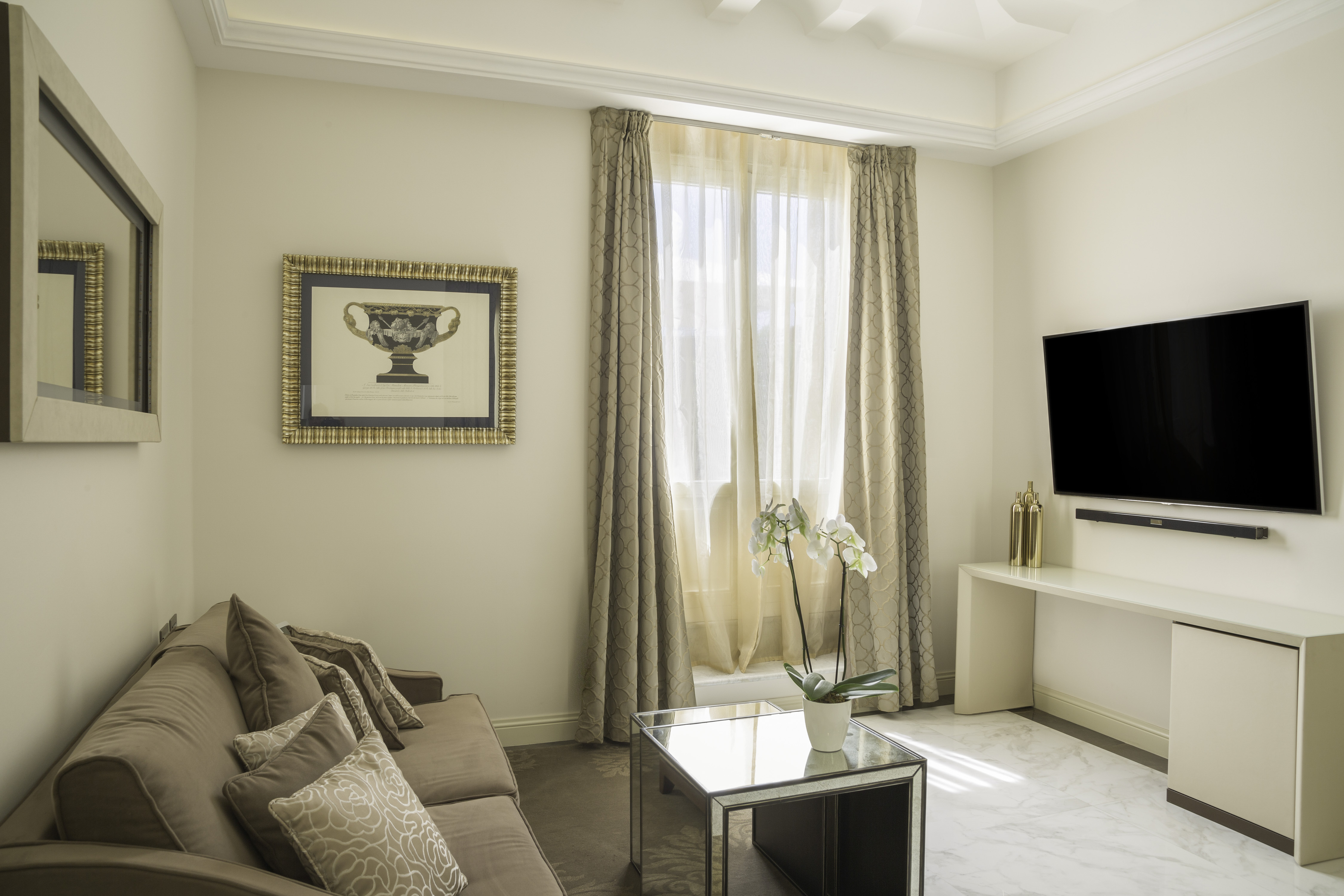 a living room with a tv and a couch