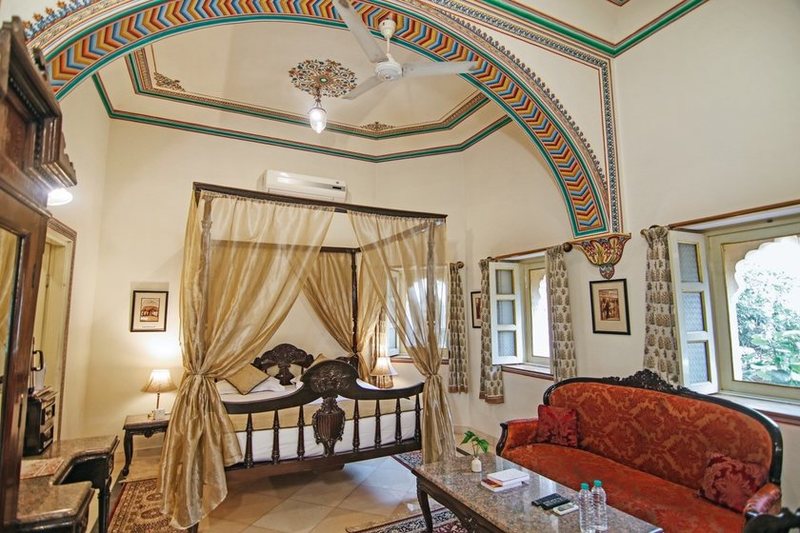 a room with a bed and a couch