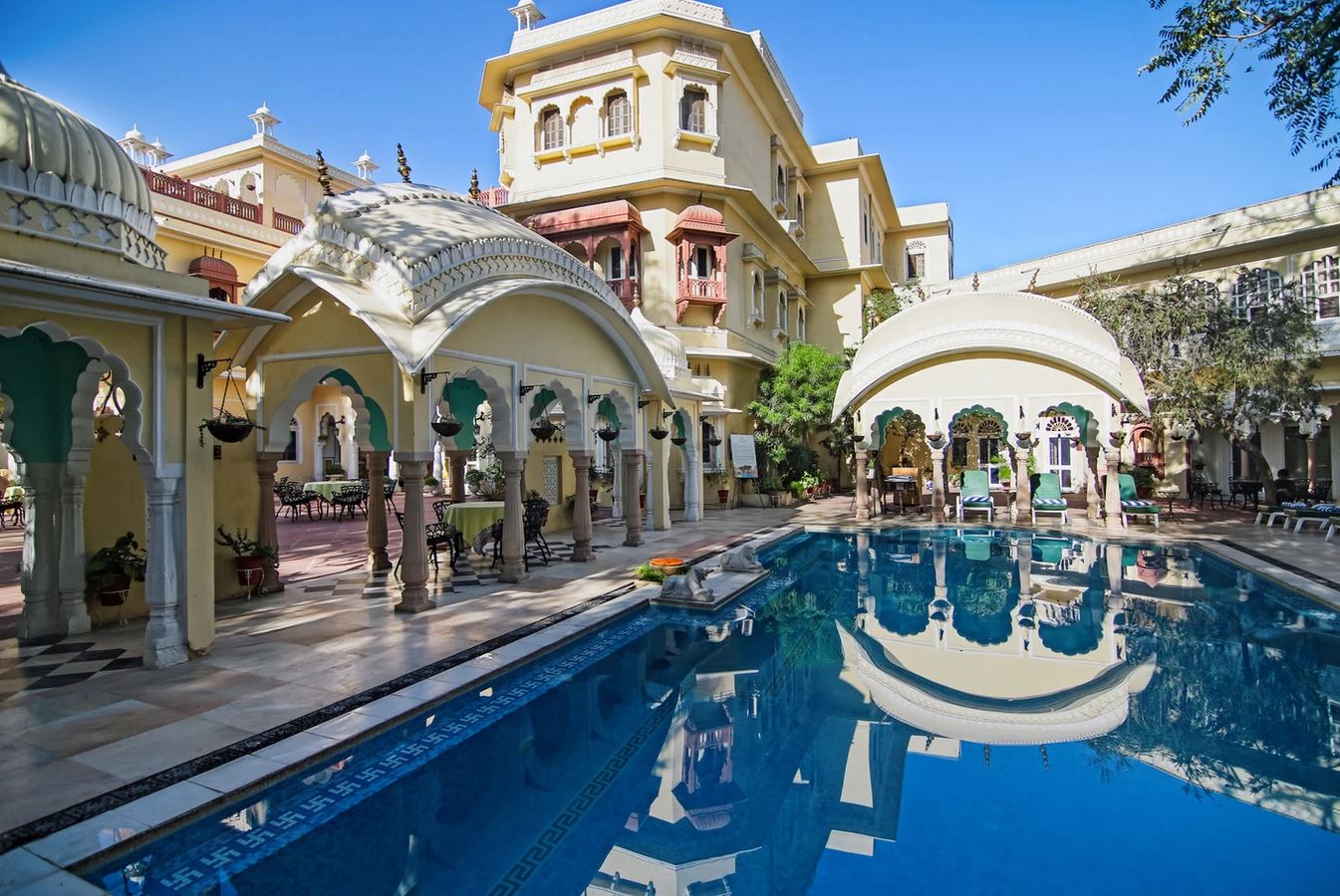 a pool in front of a building