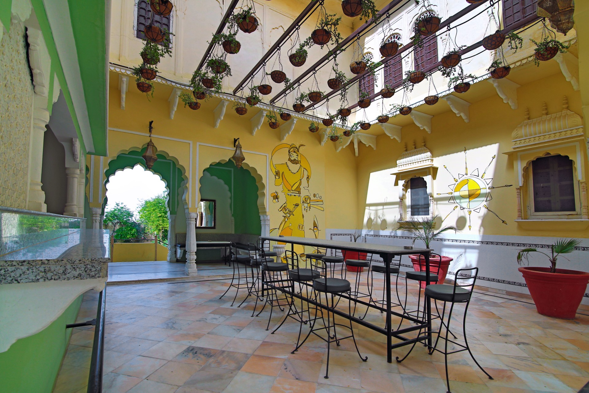 a room with chairs and tables