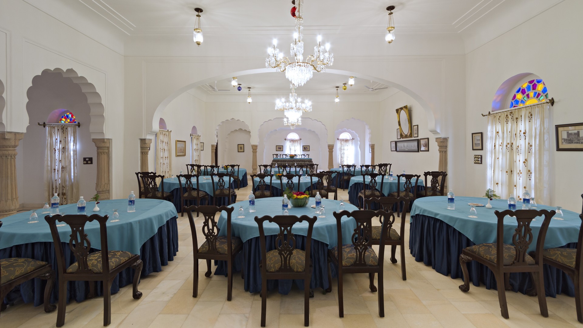 a room with tables and chairs