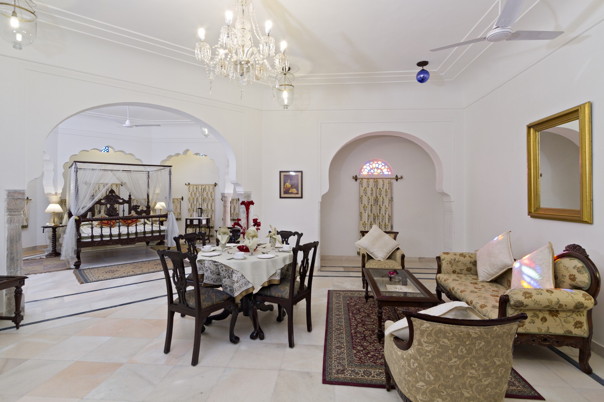 a room with a table and chairs
