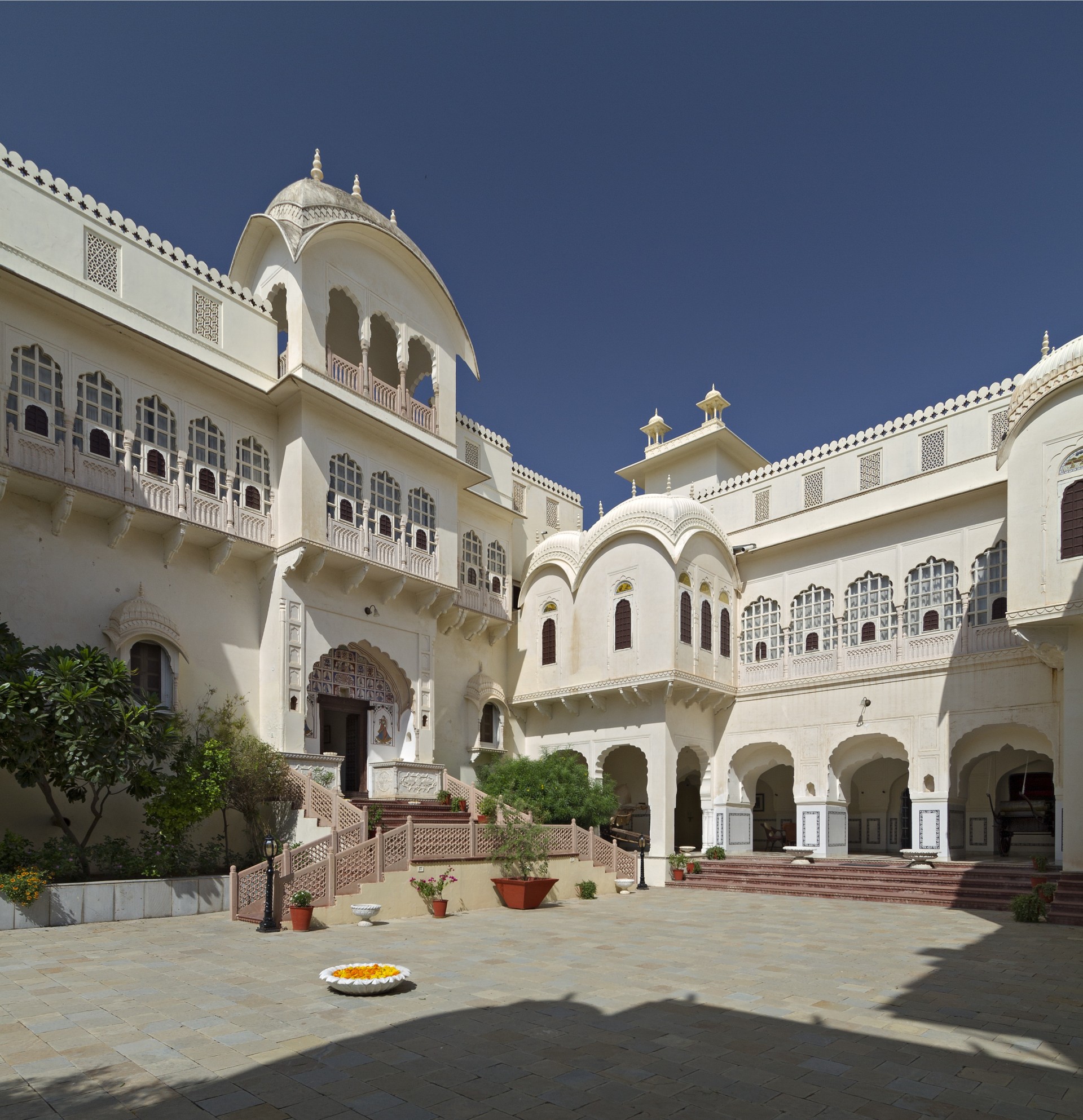 a white building with arched windows
