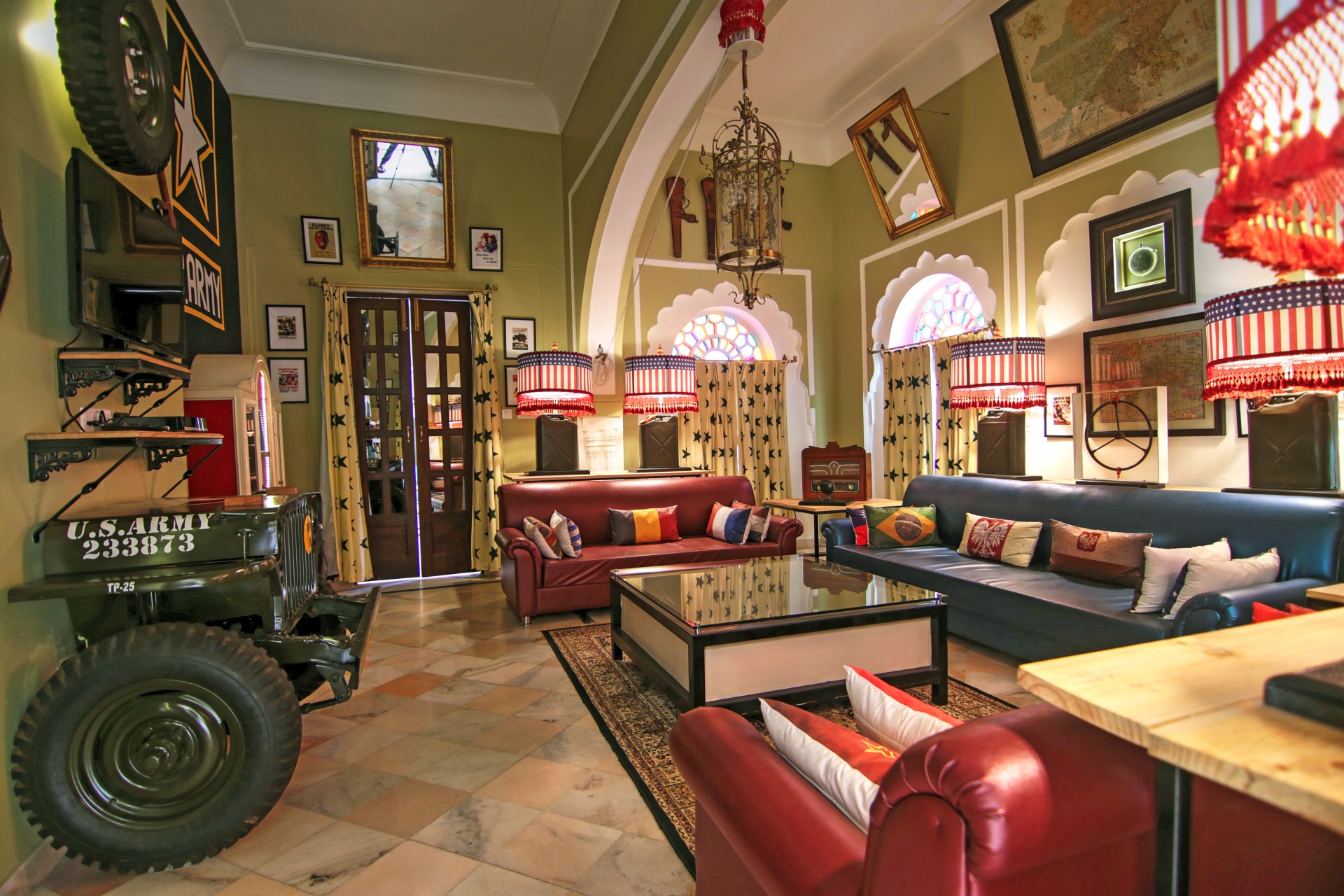 a living room with a jeep and a jeep on the wall