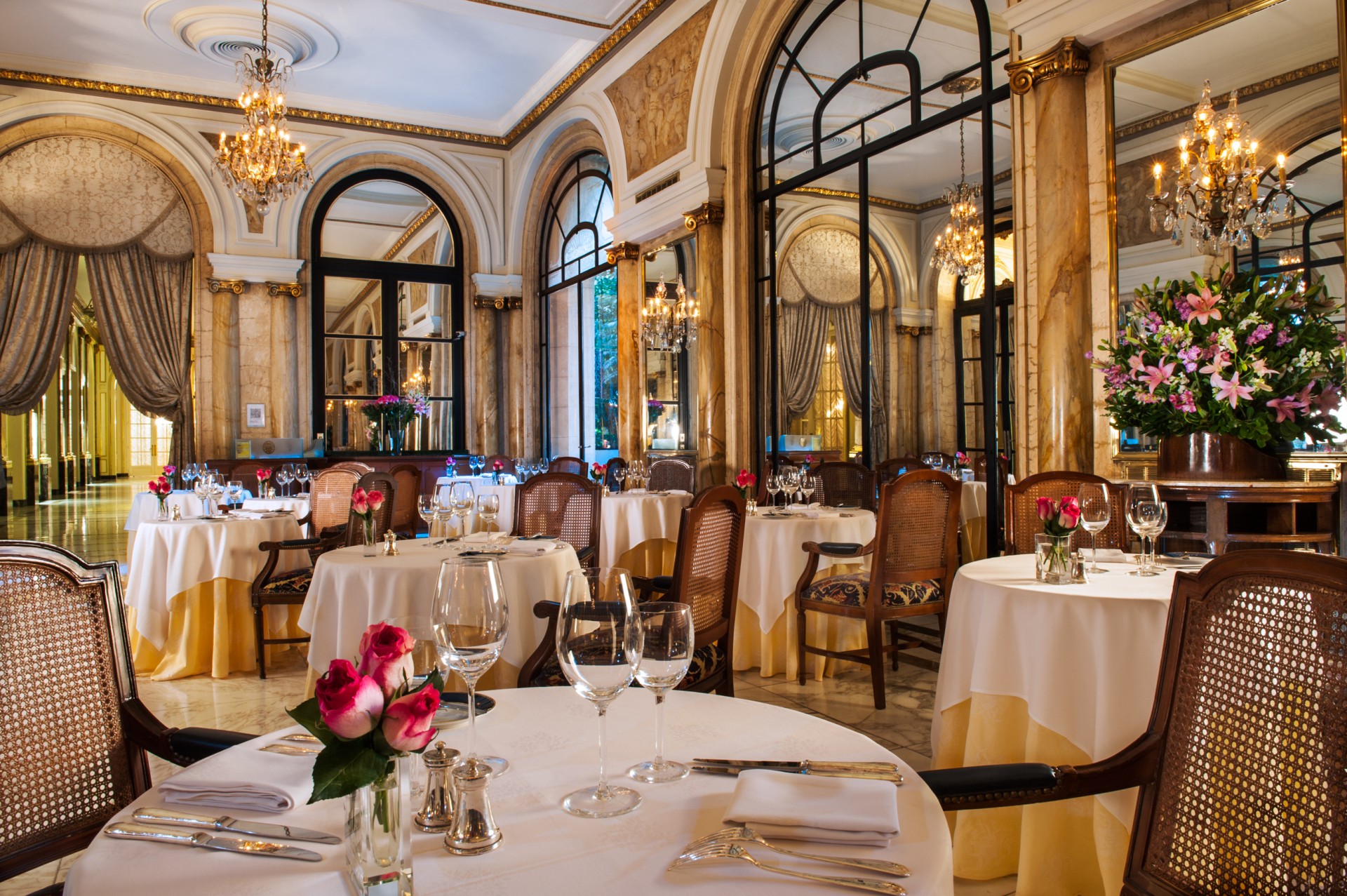 a restaurant with tables and chairs