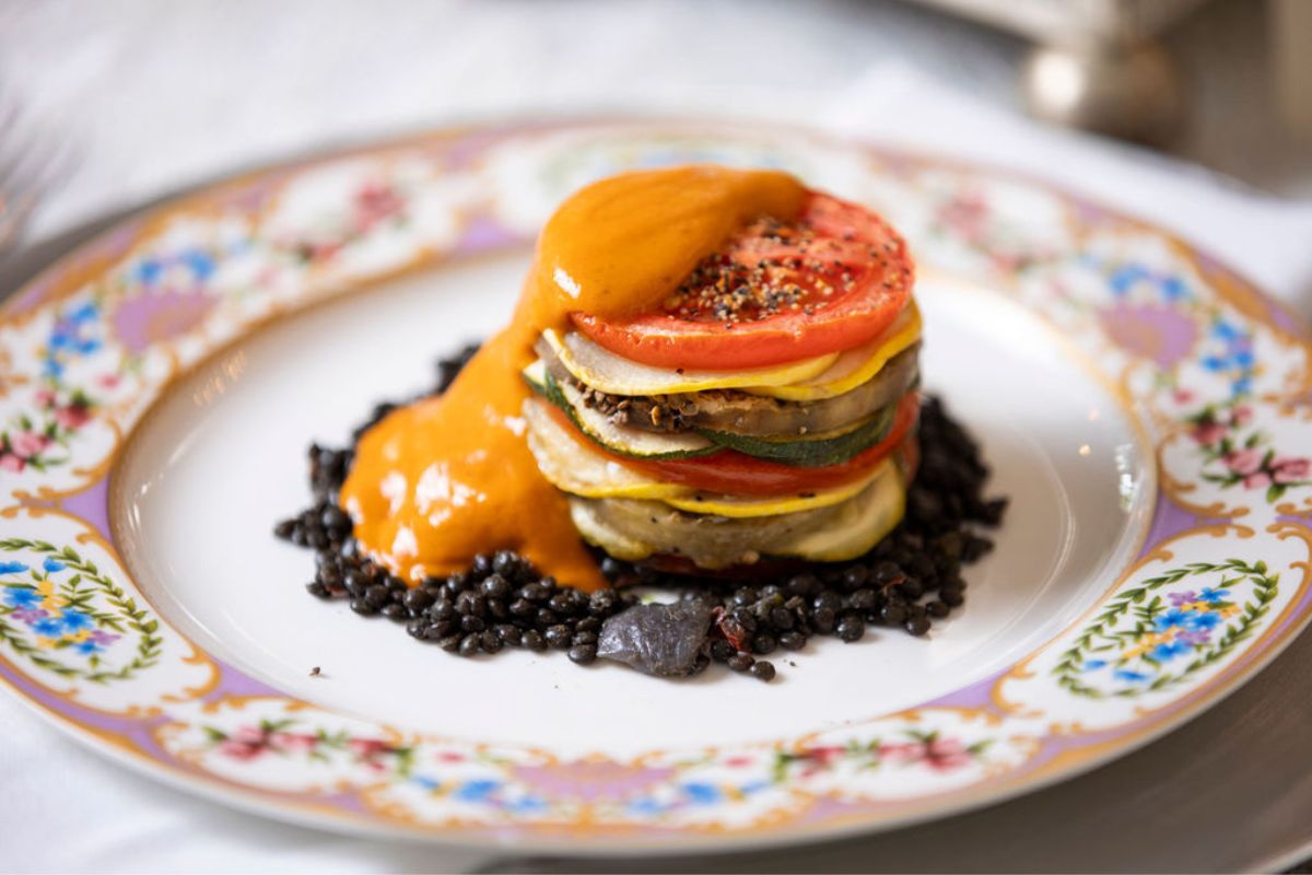a plate of food with sauce on it