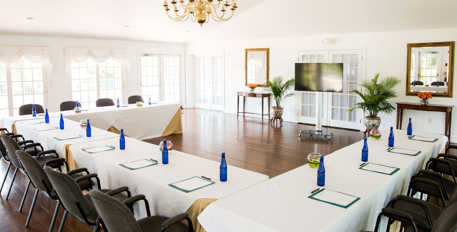 a room with tables and chairs