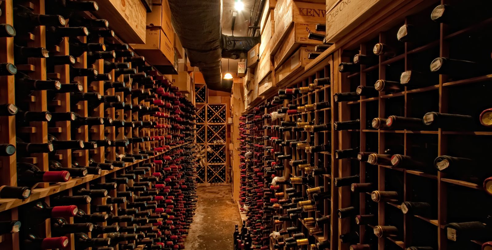 a wine cellar with many bottles