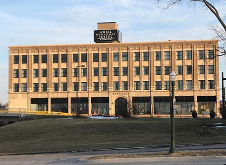 a building with a sign on the top