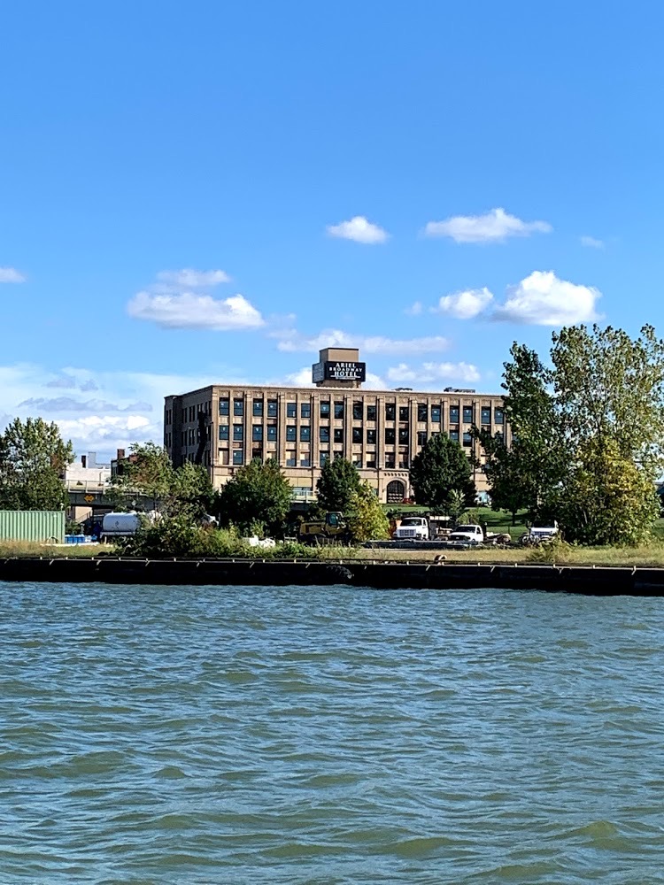 a building next to a body of water