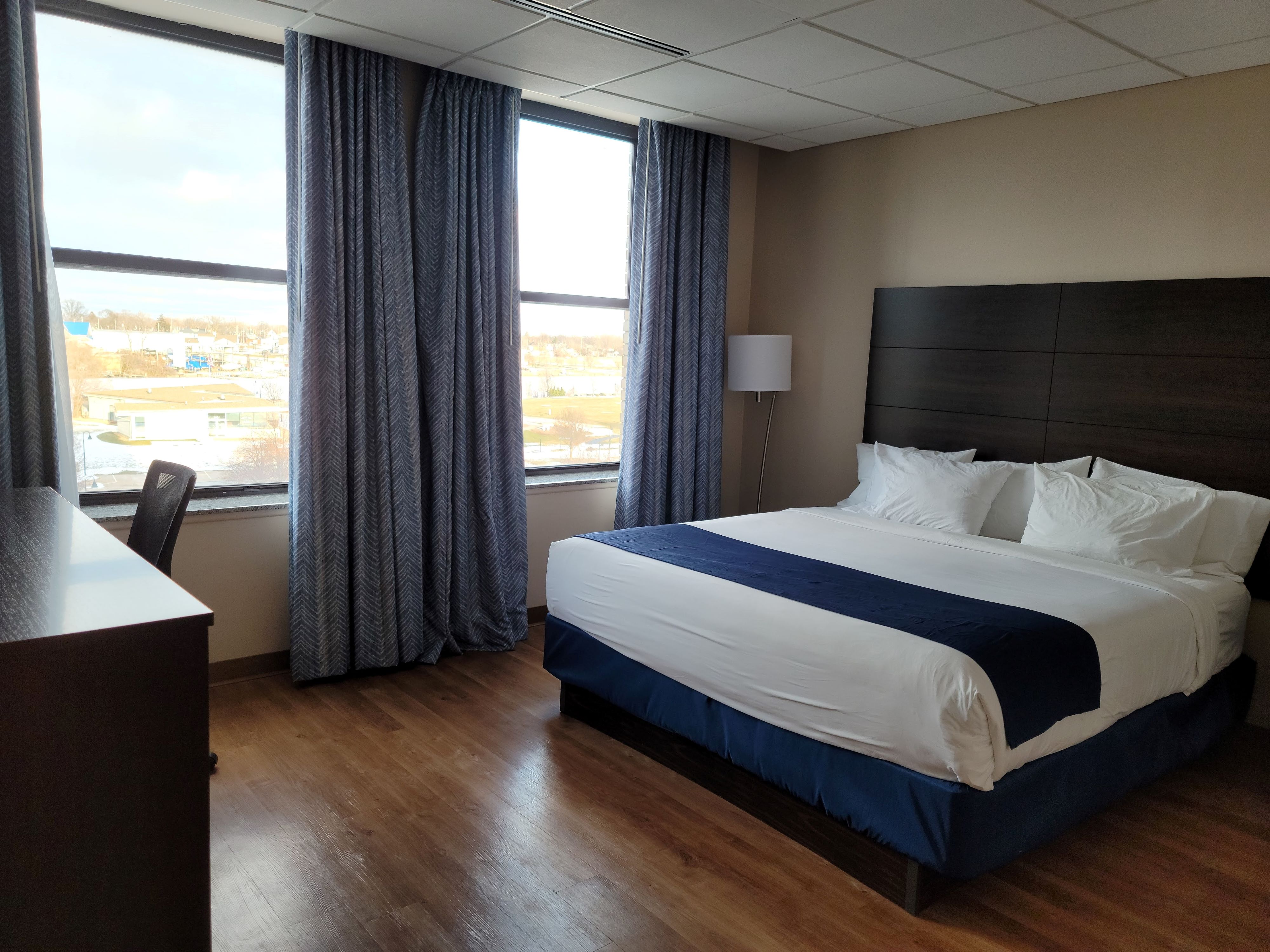 a room with a bed and a table