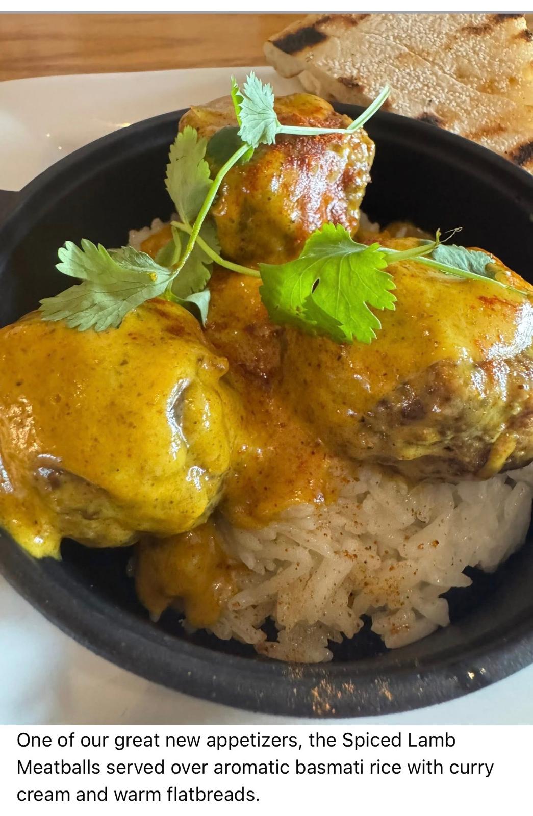 a bowl of food with meat and rice