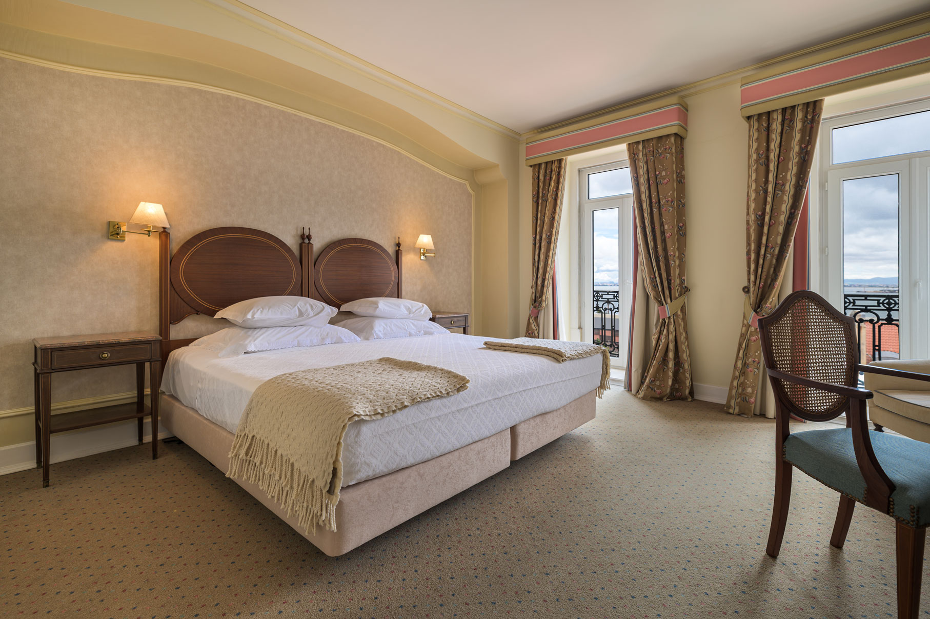 a bedroom with a bed and curtains