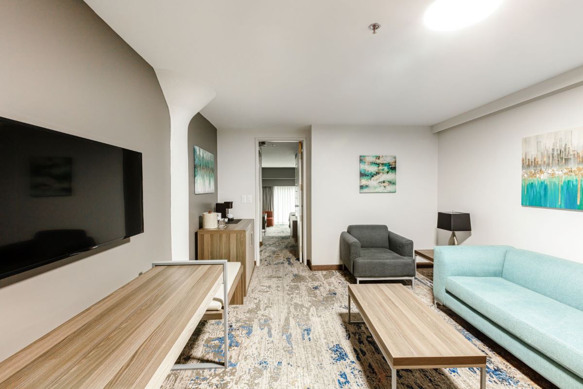 a room with a television and couches