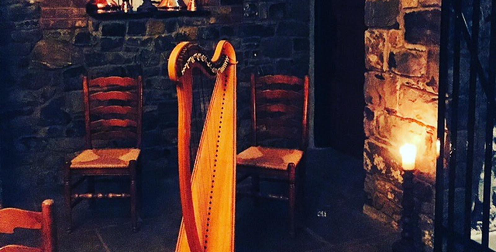 a harp next to a chair