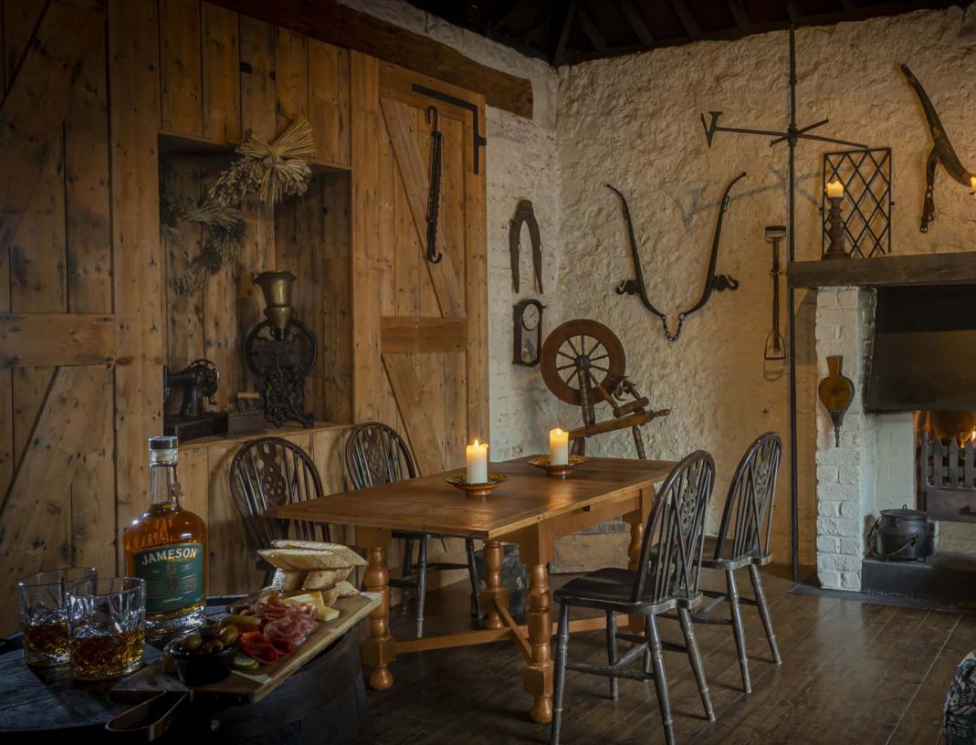 a room with a table and chairs