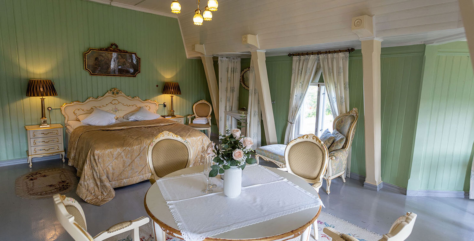 a room with a bed and a table