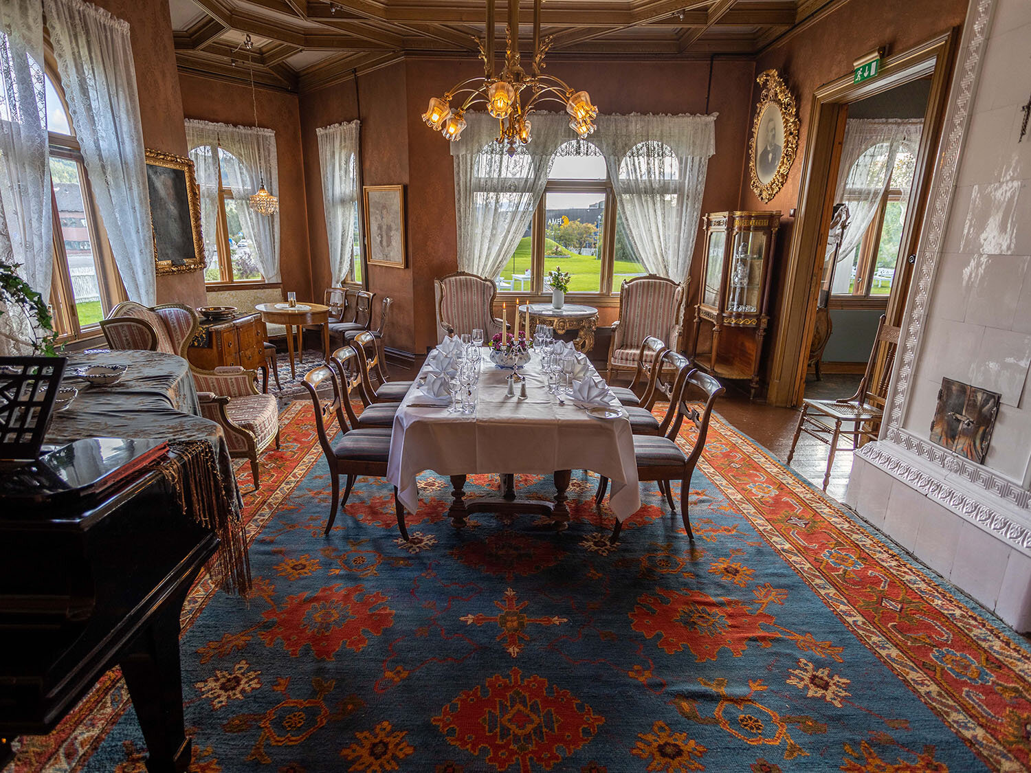 a room with a table and chairs