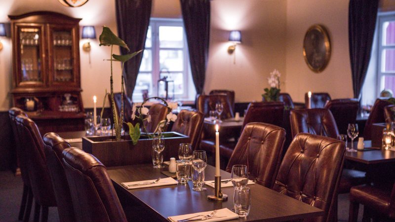 a restaurant with chairs and tables