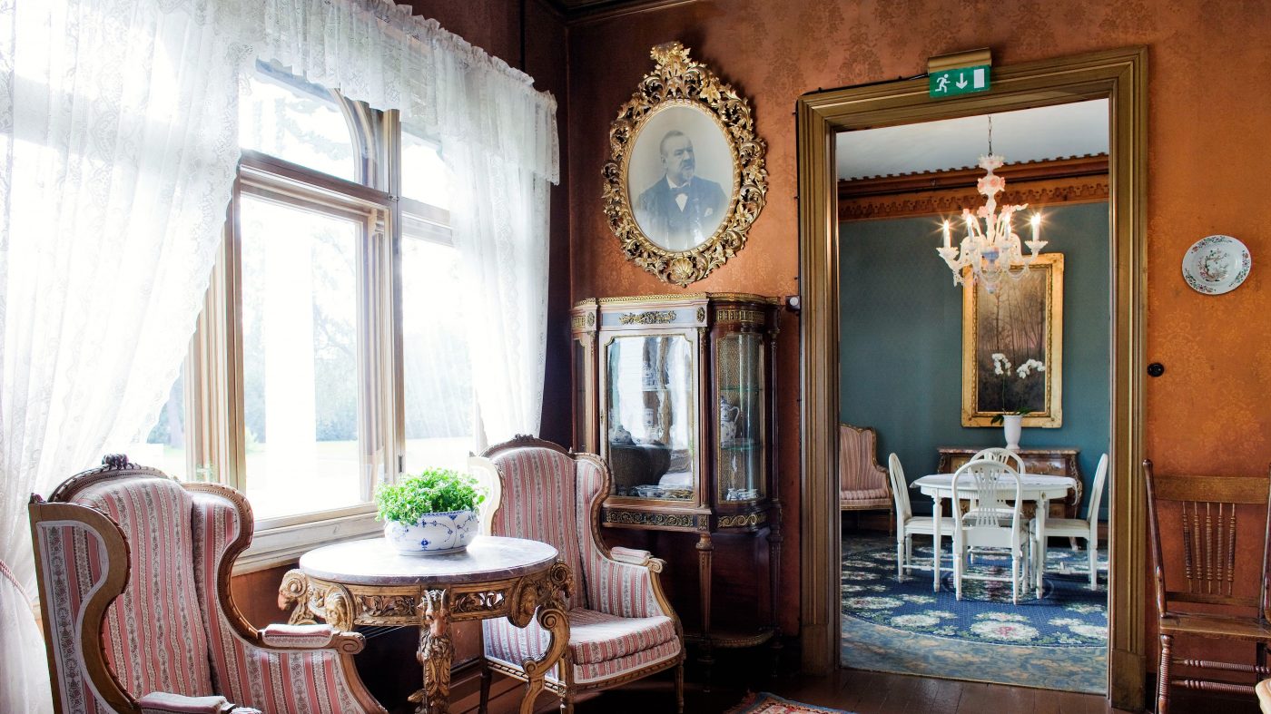 a room with a table and chairs