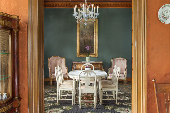a room with a table and chairs