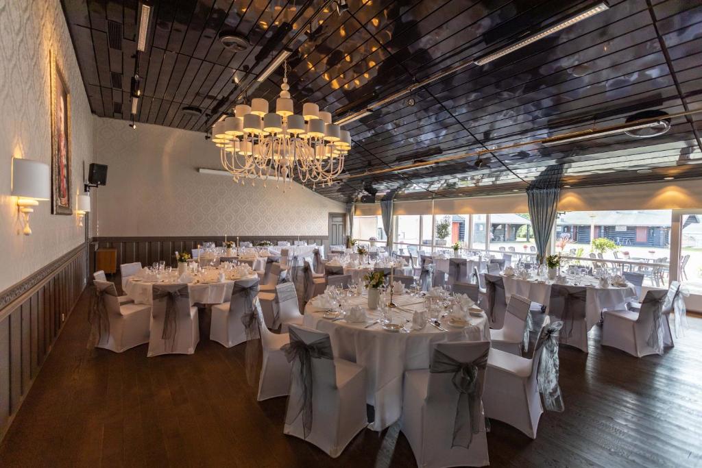 a room with tables and chairs